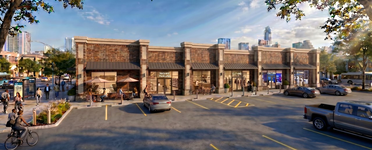 rendering of a brick commercial development with landscaped storefronts